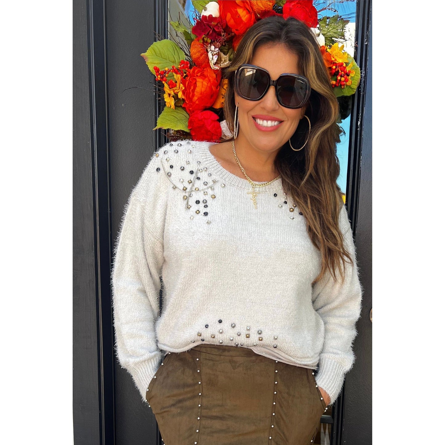 Can't help but love studded sweater